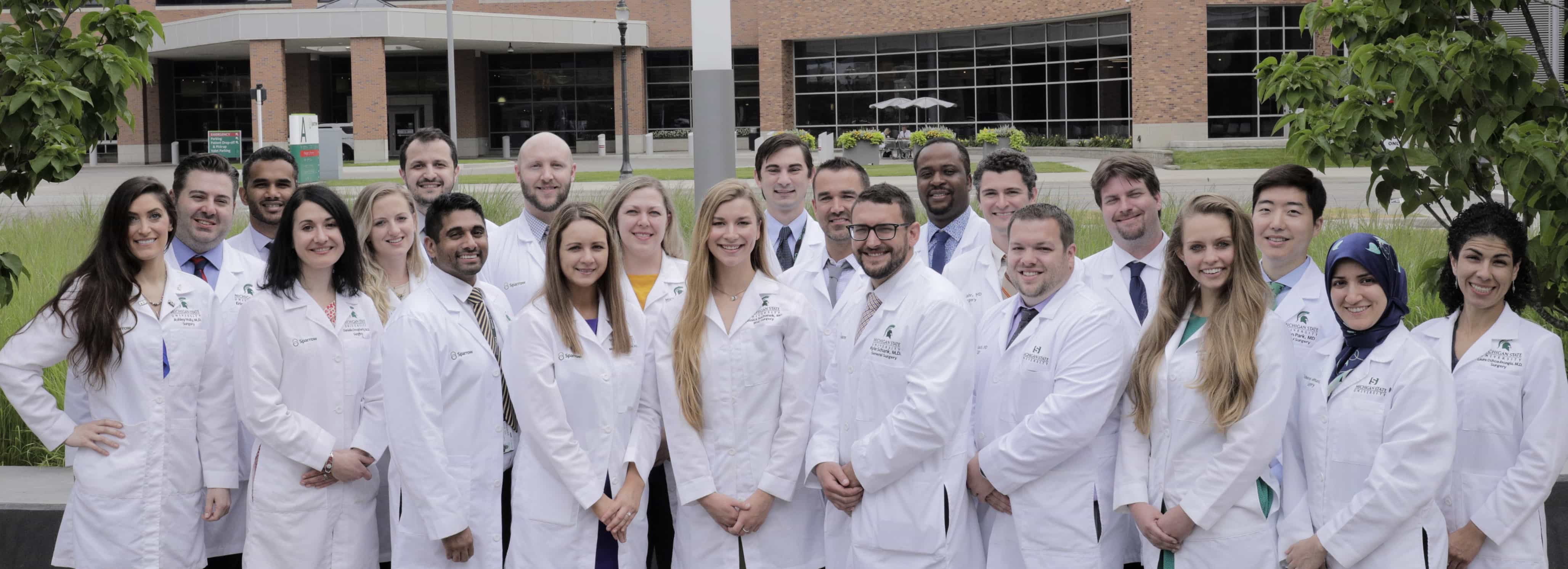Residents in lab coats