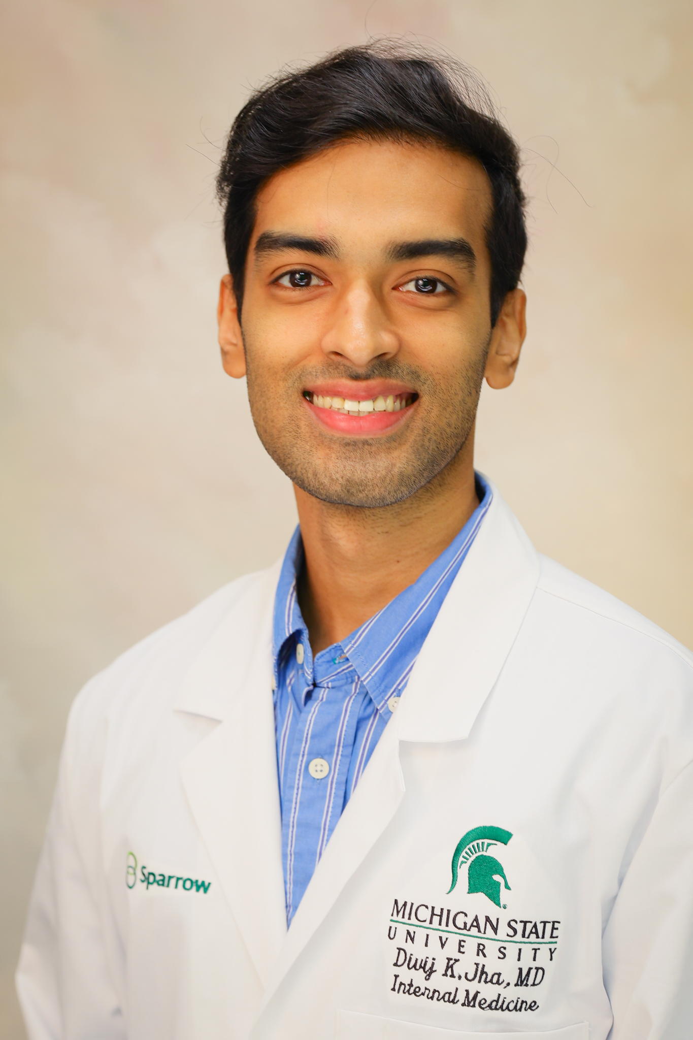 Divij Jha, MD